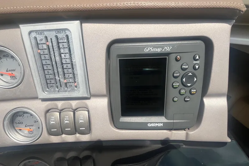 Slide: The Image of Dashboard of a 2007 Cobalt 343 featuring Garmin GPSmap 292 and Livorsi gauges. - 16
