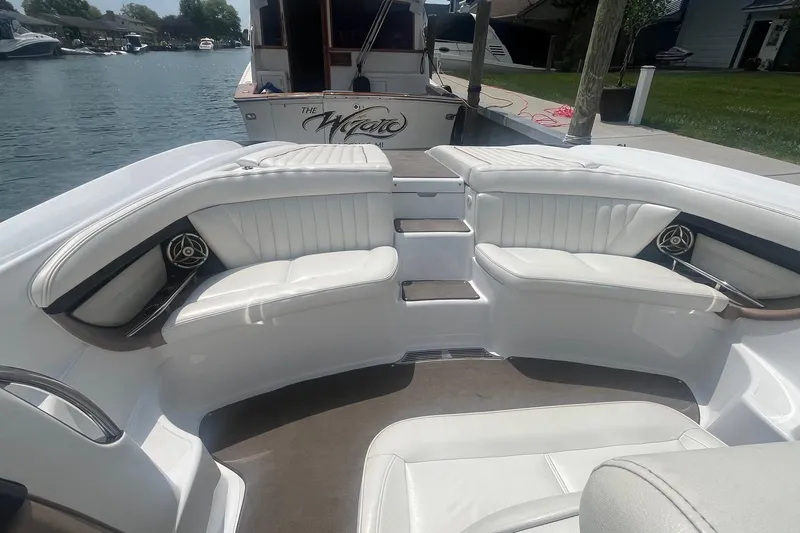 Slide: The Image of Luxurious seating area on a 2007 Cobalt 343 boat, docked by the water. - 8