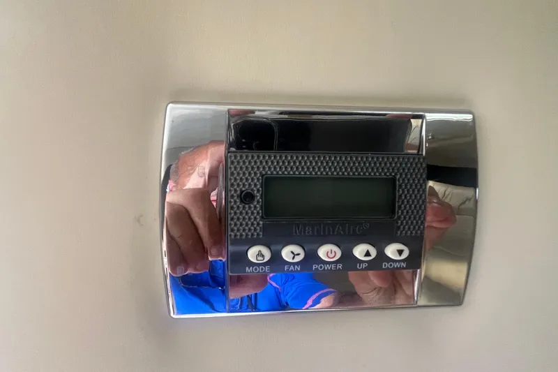 Slide: The Image of Digital control panel with buttons for mode, fan, power, up, and down on a Cobalt 343. - 17