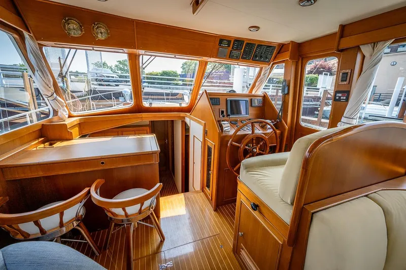 Slide: The Image of Lower helm to stbd and sliding cabin door next to helm - 8