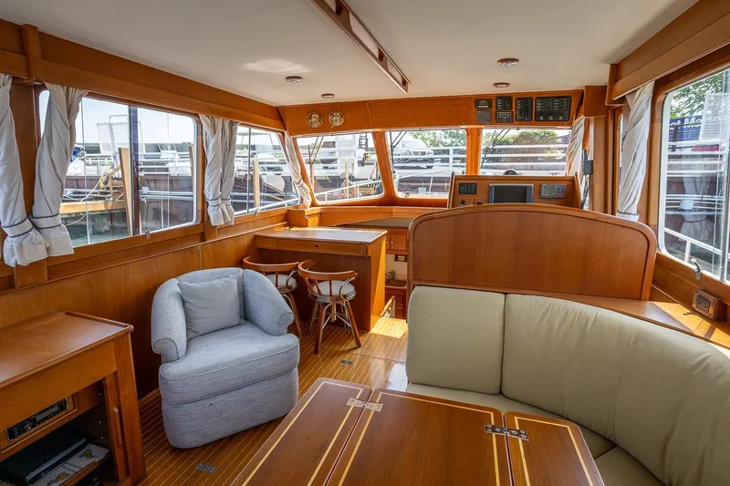 Slide: The Image of Port side salon. All teak interior - 7
