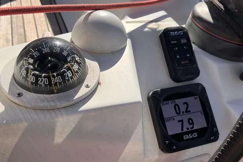 Slide: The Image of Compass and navigation instruments on a 2015 Jeanneau Sun Odyssey 379 sailboat. - 18