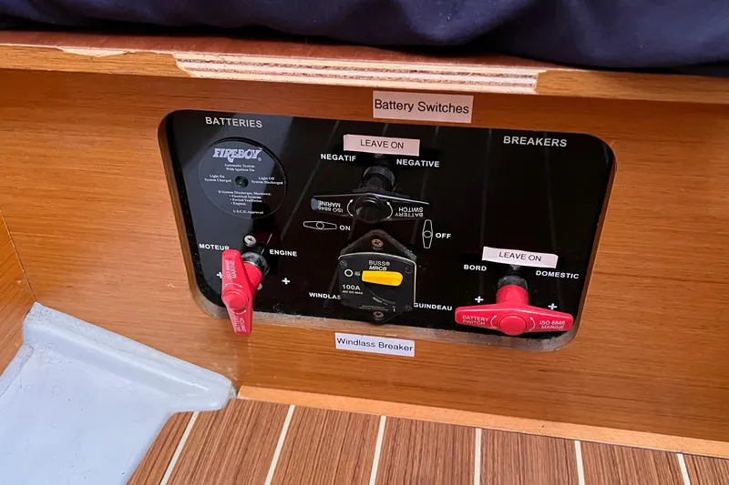 Slide: The Image of Control panel of a 2015 Jeanneau Sun Odyssey 379 sailboat with battery switches. - 47