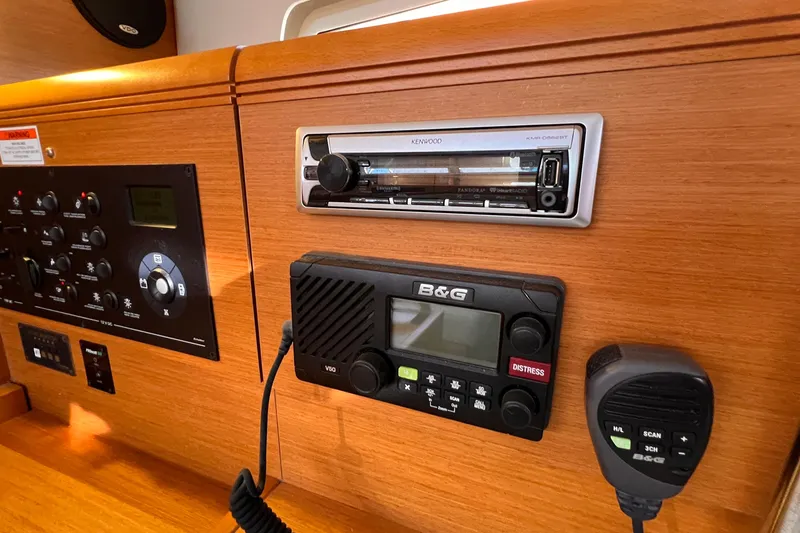 Slide: The Image of Control panel and radio equipment on a 2015 Jeanneau Sun Odyssey 379 yacht. - 48