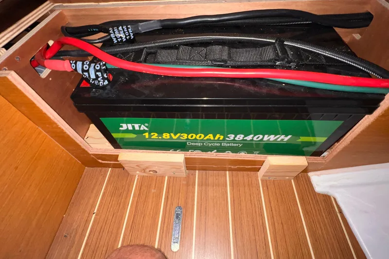 Slide: The Image of Battery compartment of 2015 Jeanneau Sun Odyssey 379 with JITA 12.8V 300Ah deep cycle battery. - 50