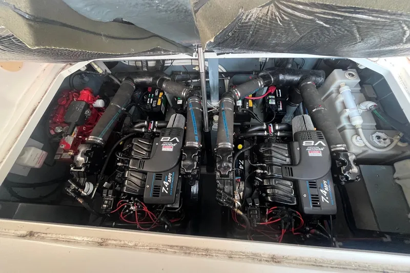 Slide: The Image of Engine compartment of a 2001 Sea Ray 340 Sundancer with twin 8A engines. - 32