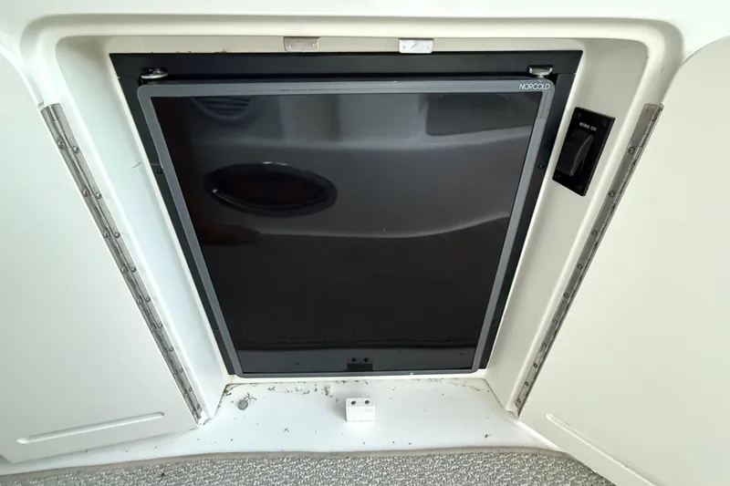 Slide: The Image of Built-in refrigerator on a 2001 Sea Ray 340 Sundancer boat. - 11
