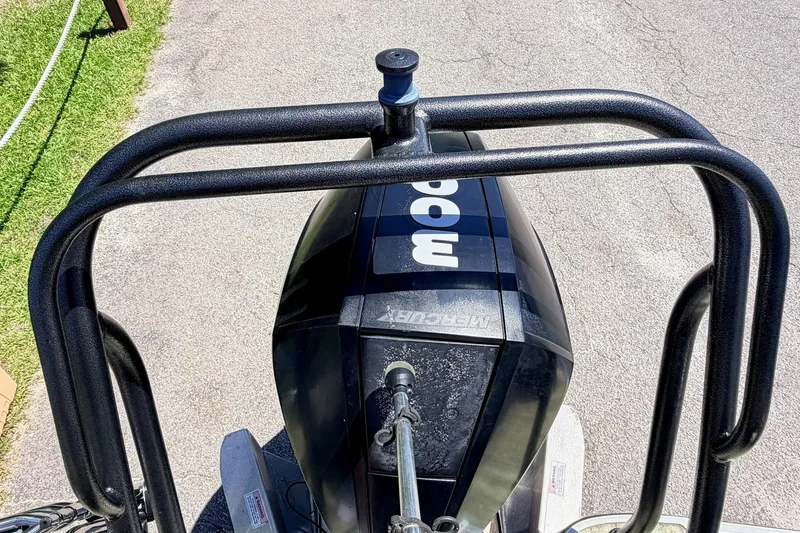 Slide: The Image of Top view of a 2020 Crest Savannah 250 SLS boat engine on pavement. - 5
