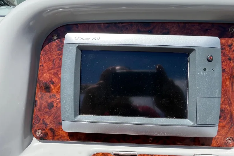 Slide: The Image of GPS display on 2002 Formula 330 Sun Sport boat dashboard. - 14