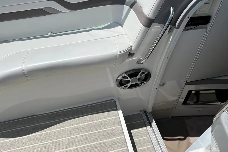 Slide: The Image of Interior of 2002 Formula 330 Sun Sport boat with seating and speaker. - 18
