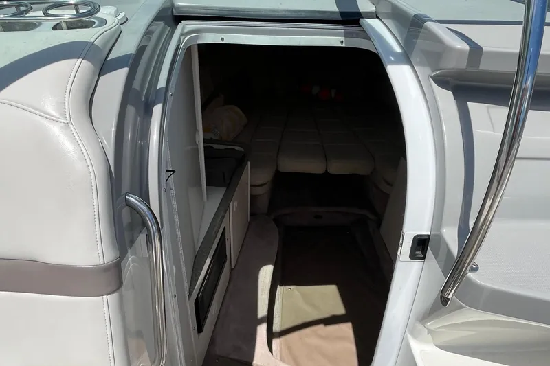 Slide: The Image of Interior cabin view of a 2002 Formula 330 Sun Sport boat. - 19