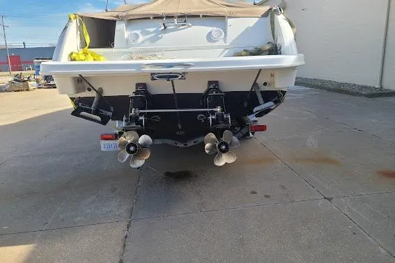 Slide: The Image of Rear view of a 2002 Formula 330 Sun Sport boat with dual propellers. - 38