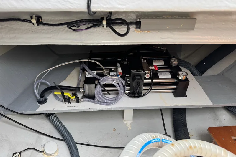 Slide: The Image of Interior view of a 2025 Lagoon 46 yacht's mechanical compartment. - 15