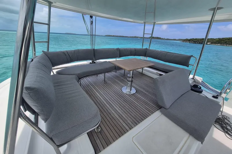 Slide: The Image of Luxurious seating area on 2025 Lagoon 46 yacht with ocean view. - 5