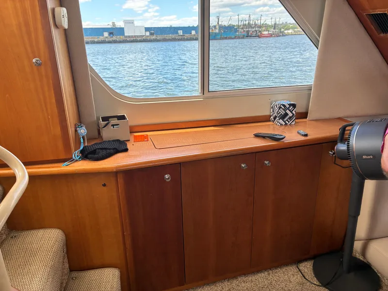 Slide: The Image of Interior of a 2001 Silverton 392 Motor Yacht with a view of the water. - 27