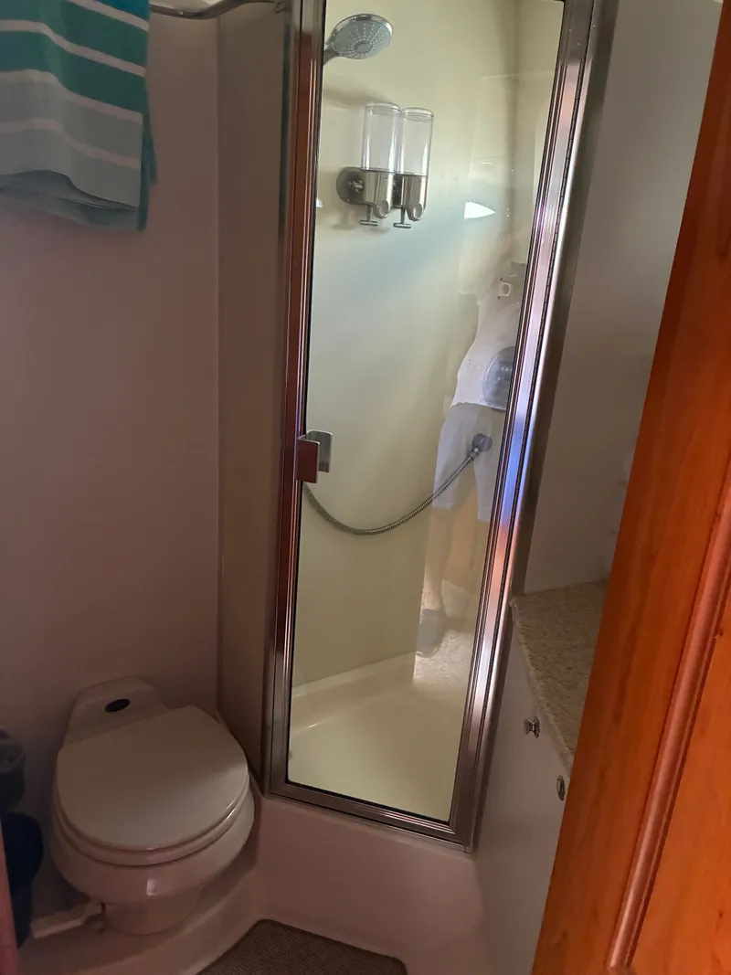 Slide: The Image of Bathroom with shower and toilet in a yacht. - 34