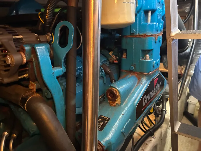 Slide: The Image of Close-up of a blue Crusader engine in a 2001 Silverton 392 Motor Yacht. - 45