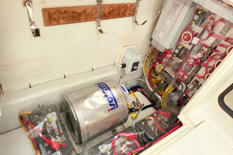 Slide: The Image of Electrical system of a 2009 Ranger Tugs R-29 boat, featuring wiring and components. - 22