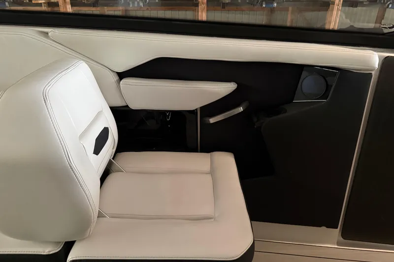 Slide: The Image of 2026 Yamaha Boats 295SD interior with sleek, modern seating and stylish design. - 11