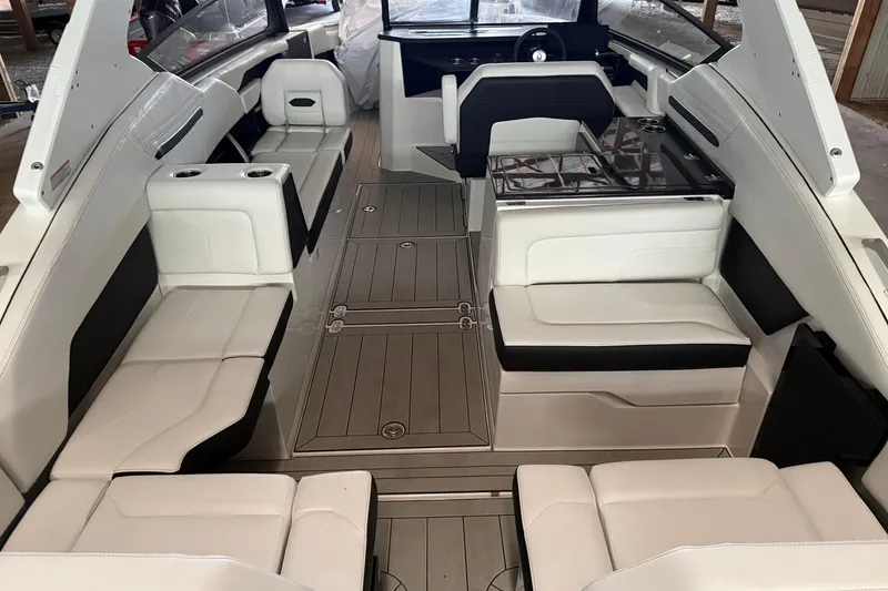 Slide: The Image of 2026 Yamaha Boats 295SD interior with sleek seating and modern design. - 6