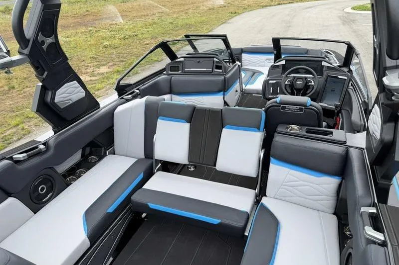 Slide: The Image of 2026 Supra SA boat interior with modern seating, steering wheel, and sleek design elements. - 15