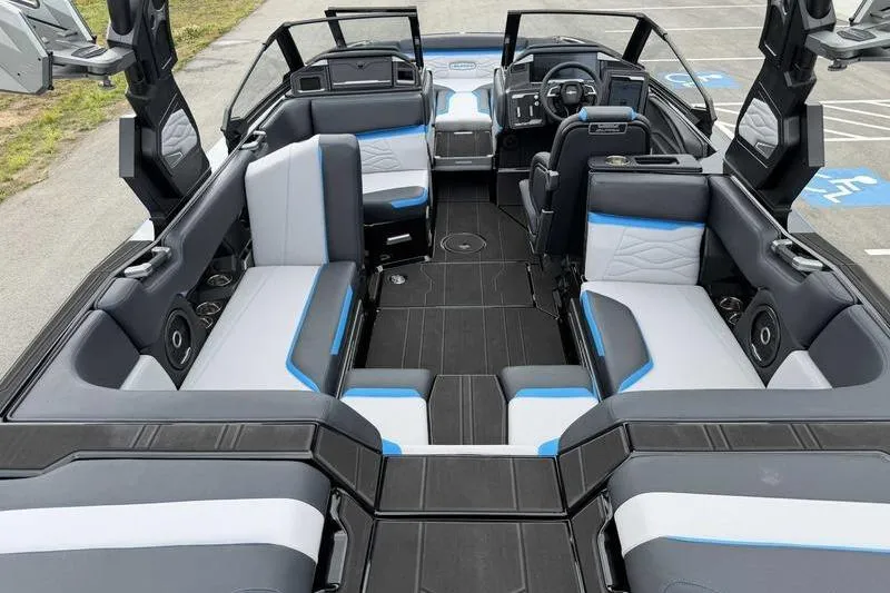 Slide: The Image of 2026 Supra SA boat interior with modern seating, sleek design, and advanced dashboard features. - 14
