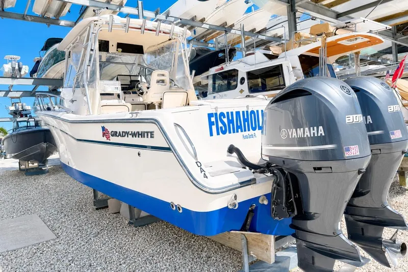 Slide: The Image of 2007 Grady-White Marlin 300 boat with twin Yamaha engines in storage. - 3