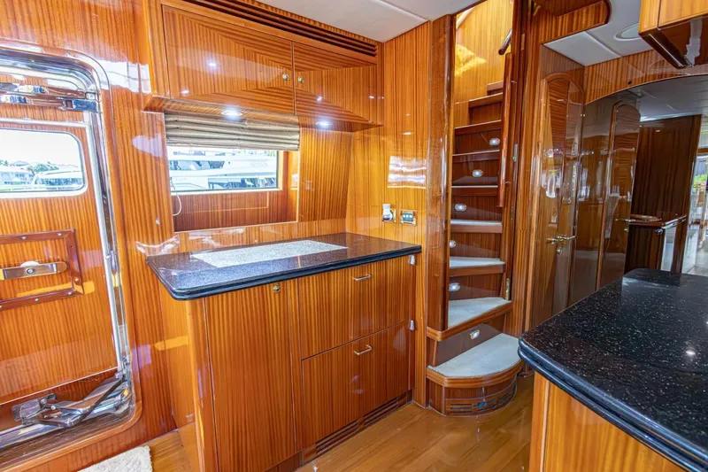 Slide: The Image of Luxurious wooden interior of 2008 Hargrave Enclosed Skylounge MY yacht with elegant staircase. - 15