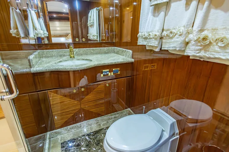 Slide: The Image of Luxurious bathroom in 2008 Hargrave Enclosed Skylounge MY yacht with marble accents and elegant wood finishes. - 32