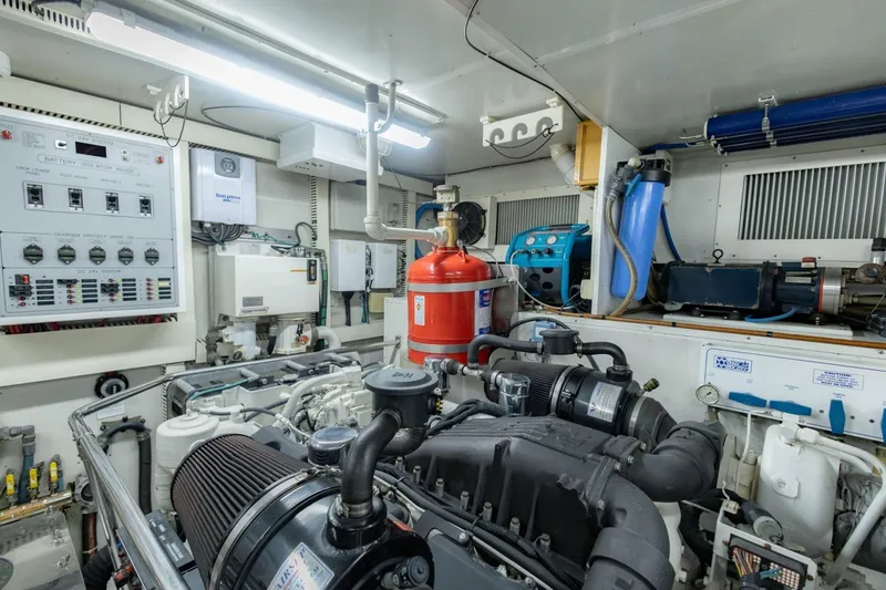 Slide: The Image of Engine room of 2008 Hargrave Enclosed Skylounge MY yacht, featuring advanced machinery and control panels. - 62