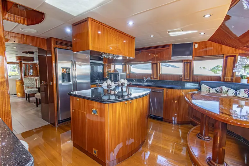 Slide: The Image of Luxurious kitchen interior of 2008 Hargrave Enclosed Skylounge MY yacht with wood finishes. - 16