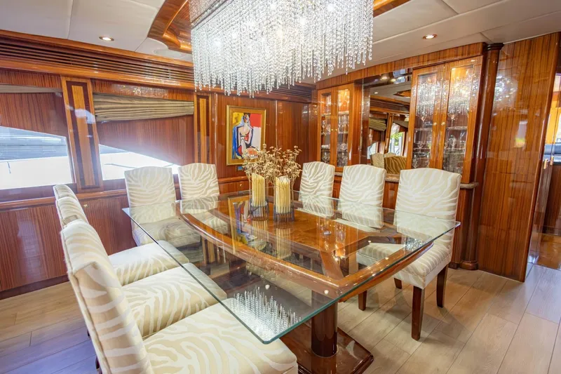 Slide: The Image of Luxurious dining area on 2008 Hargrave Enclosed Skylounge MY yacht with elegant decor and chandelier. - 8