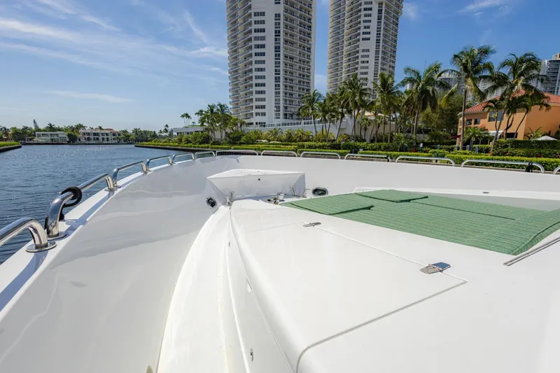 Slide: The Image of 2008 Hargrave Enclosed Skylounge MY yacht deck with cityscape and palm trees in the background. - 53