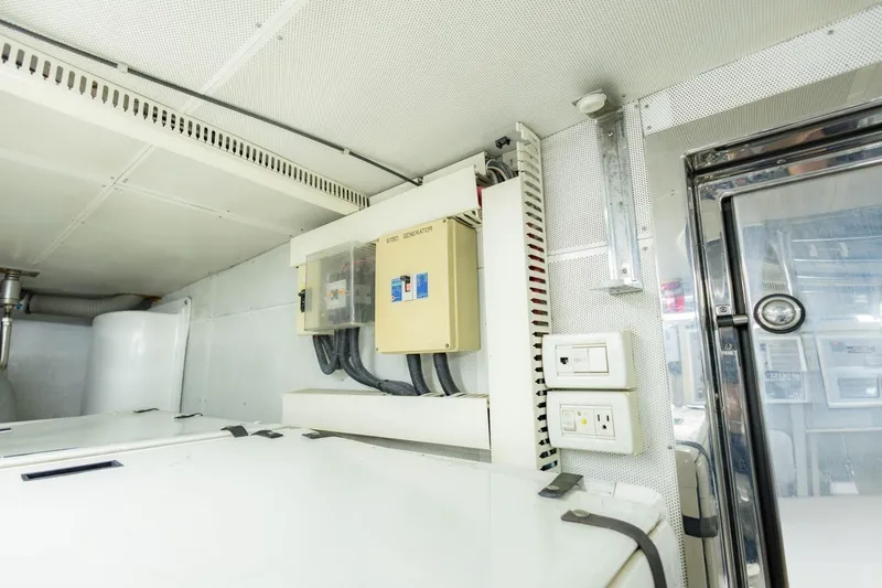 Slide: The Image of Engine room of 2008 Hargrave Enclosed Skylounge MY yacht, featuring electrical panels and equipment. - 65