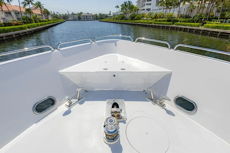 Slide: The Image of Bow view of 2008 Hargrave Enclosed Skylounge MY yacht on a serene waterway. - 52