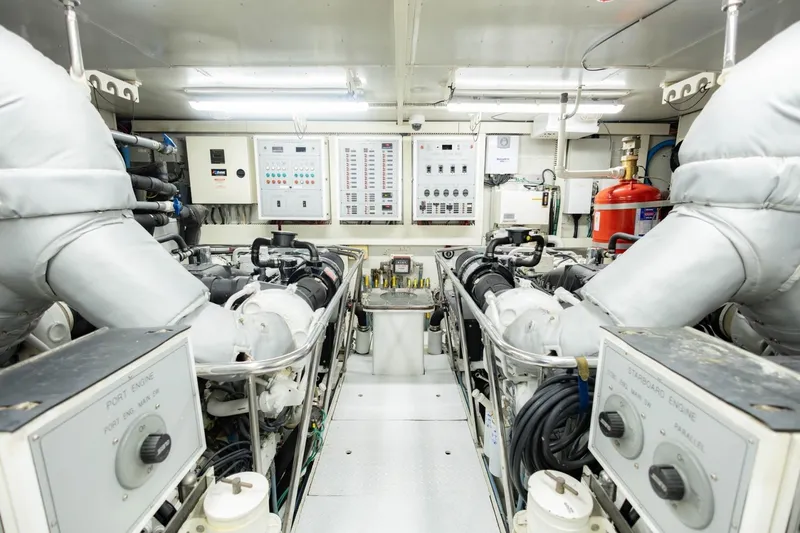 Slide: The Image of Engine room of 2008 Hargrave Enclosed Skylounge MY yacht, featuring advanced control panels and machinery. - 55