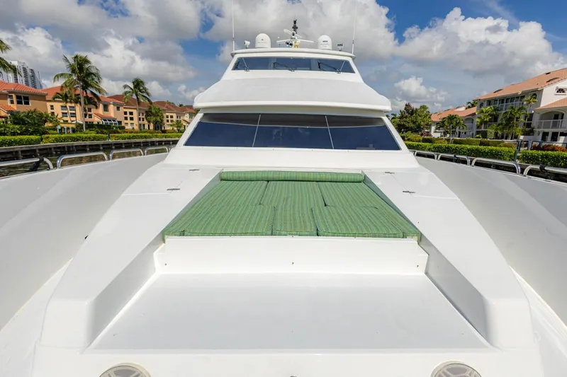 Slide: The Image of 2008 Hargrave Enclosed Skylounge MY yacht with sun deck, docked near waterfront homes. - 54