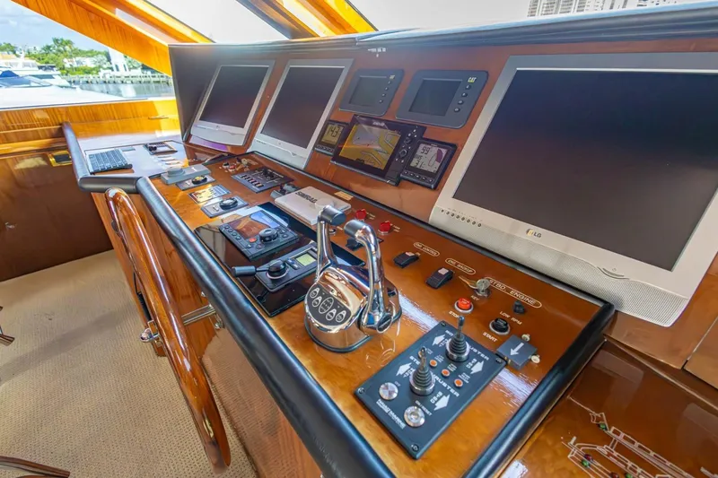 Slide: The Image of Control panel of 2008 Hargrave Enclosed Skylounge MY yacht with multiple screens and controls. - 35