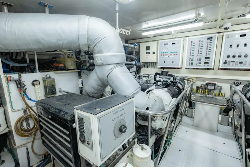 Slide: The Image of Engine room of 2008 Hargrave Enclosed Skylounge MY yacht, featuring control panels and machinery. - 61