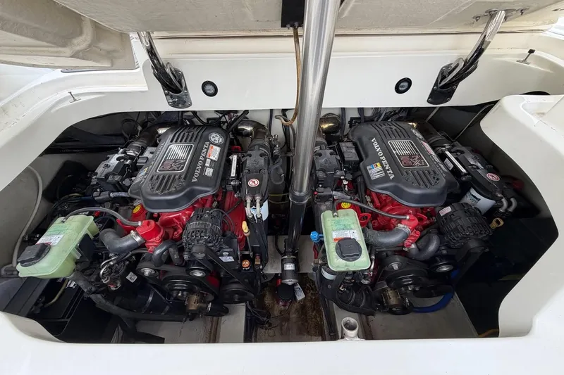 Slide: The Image of Twin Volvo Penta engines in a 2008 Cobalt 303 boat engine compartment. - 25
