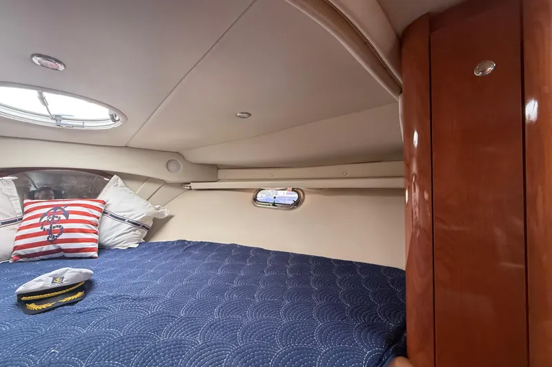 Slide: The Image of Interior cabin of 2006 Four Winns 328 Vista with nautical decor and captain's hat. - 40