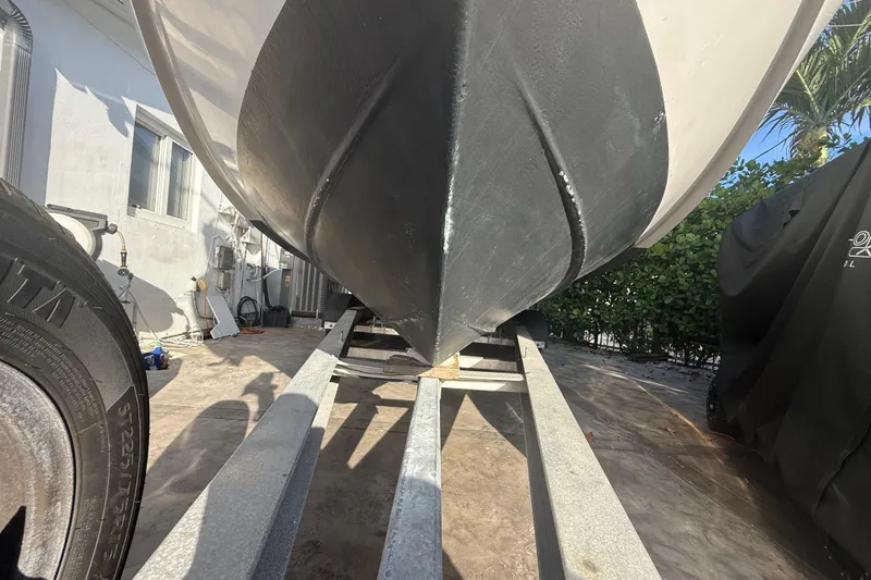 Slide: The Image of 2006 Four Winns 328 Vista boat on trailer, viewed from below. - 19