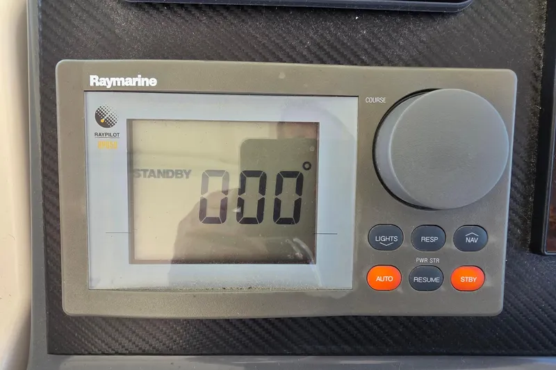 Slide: The Image of Raymarine autopilot display on 2004 Tiara Yachts 4000 Express, showing standby mode at 0 degrees. - 29