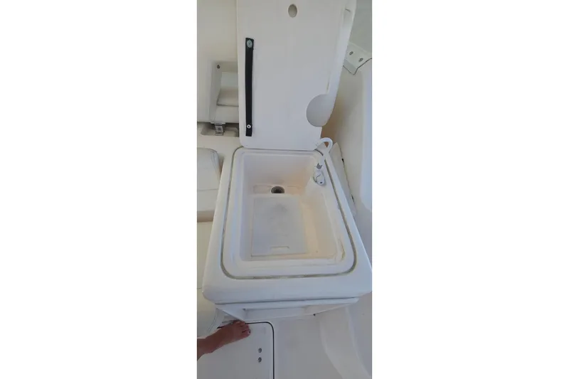 Slide: The Image of Open storage compartment on 2004 Tiara Yachts 4000 Express boat. - 38