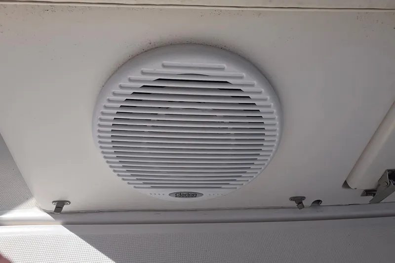 Slide: The Image of Clarion speaker installed on a 2004 Tiara Yachts 4000 Express ceiling. - 57