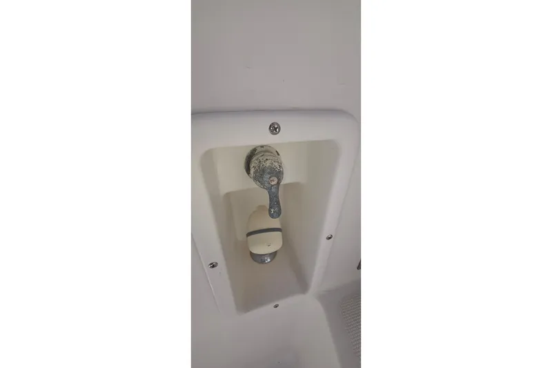 Slide: The Image of 2004 Tiara Yachts 4000 Express shower control in white enclosure. - 59