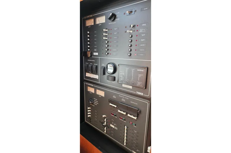 Slide: The Image of Electrical control panel of a 2004 Tiara Yachts 4000 Express boat. - 60