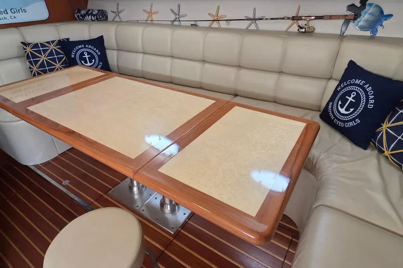 Slide: The Image of Luxurious interior of 2004 Tiara Yachts 4000 Express with elegant seating and nautical decor. - 7