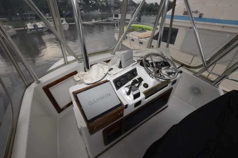 Slide: The Image of Helm of 1981 Blackfin 32 Sportfisherman with Garmin navigation system. - 15