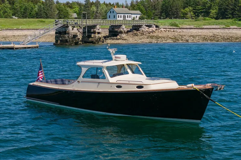 Slide: The Image of 2001 Hinckley Picnic Boat 36 Classic anchored in scenic coastal waters. - 10